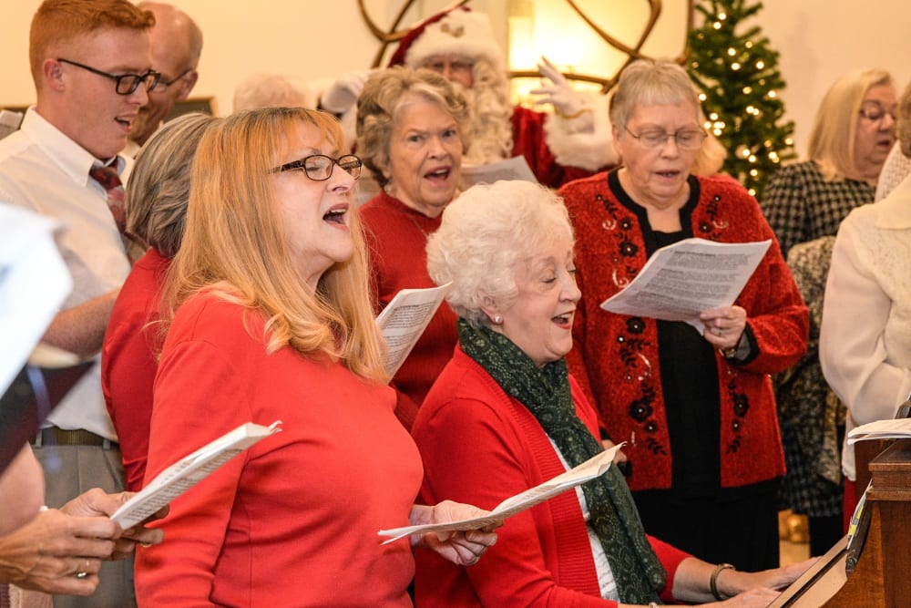 Residents singing a hymn at The Blake at Charlottesville in Charlottesville, Virginia