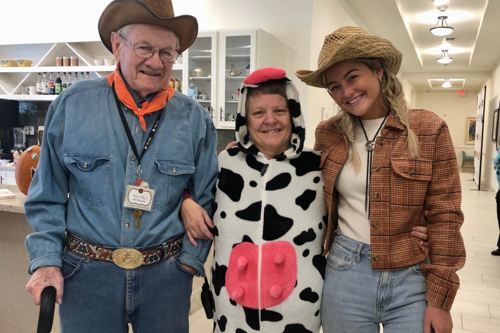 Residents dressed as cowfolk for the costume party at The Blake at Charlottesville in Charlottesville, Virginia
