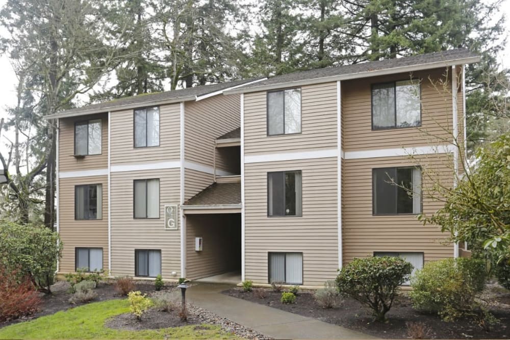 Exterior view of the 3 story apartment building at Oswego Cove in Lake Oswego, Oregon