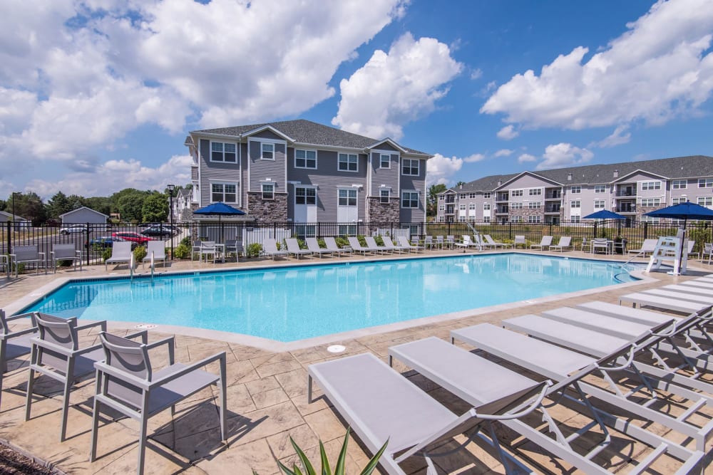 Swimming pool and lounge chairs at Avanti Luxury Apartments in Bel Air, Maryland