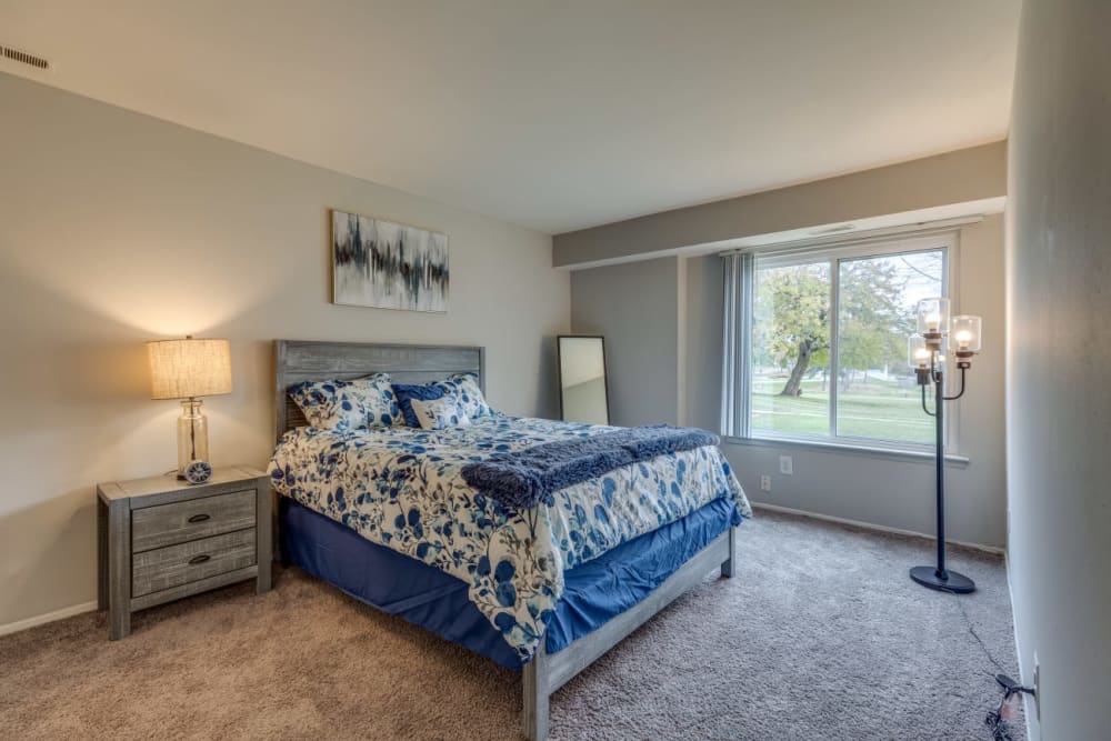 Bedroom with natural light at Retreat at Farmington Hills in Farmington Hills, Michigan