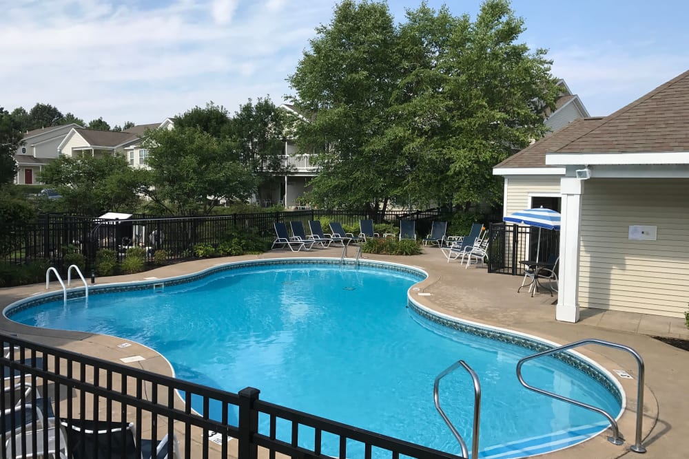 Inviting swimming pool on a sunny day at Eagle Rock Apartments & Townhomes at Rensselaer in Rensselaer, New York