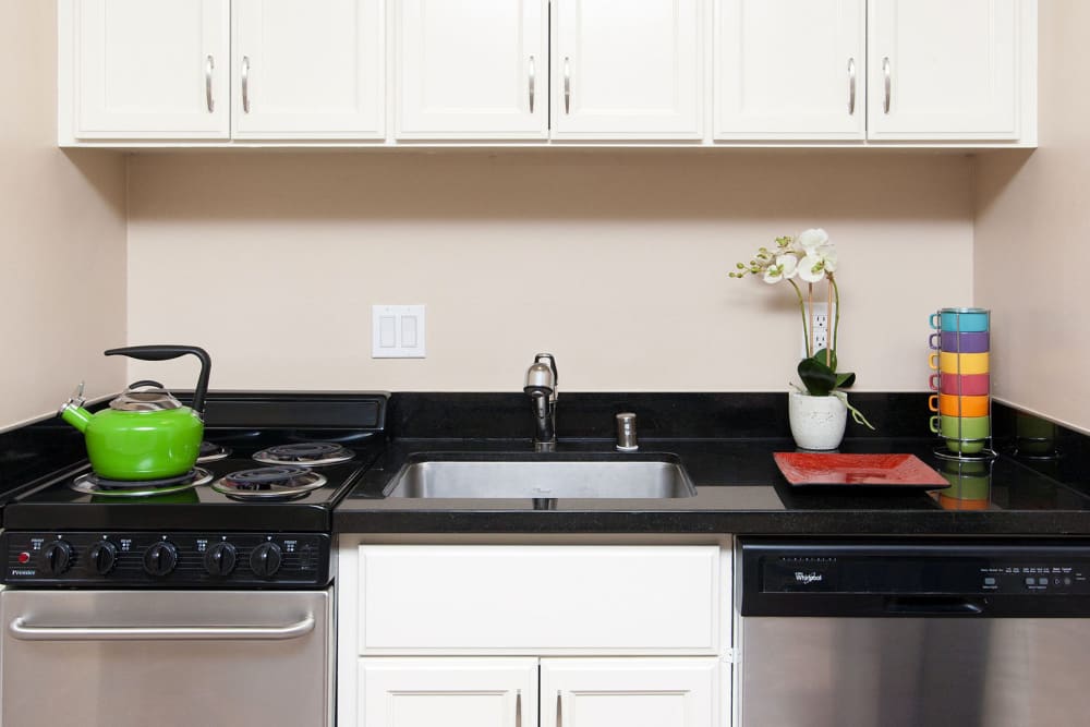 kitchen sink and stainless steel appliances at Alta off the Avenue in Burlingame, California