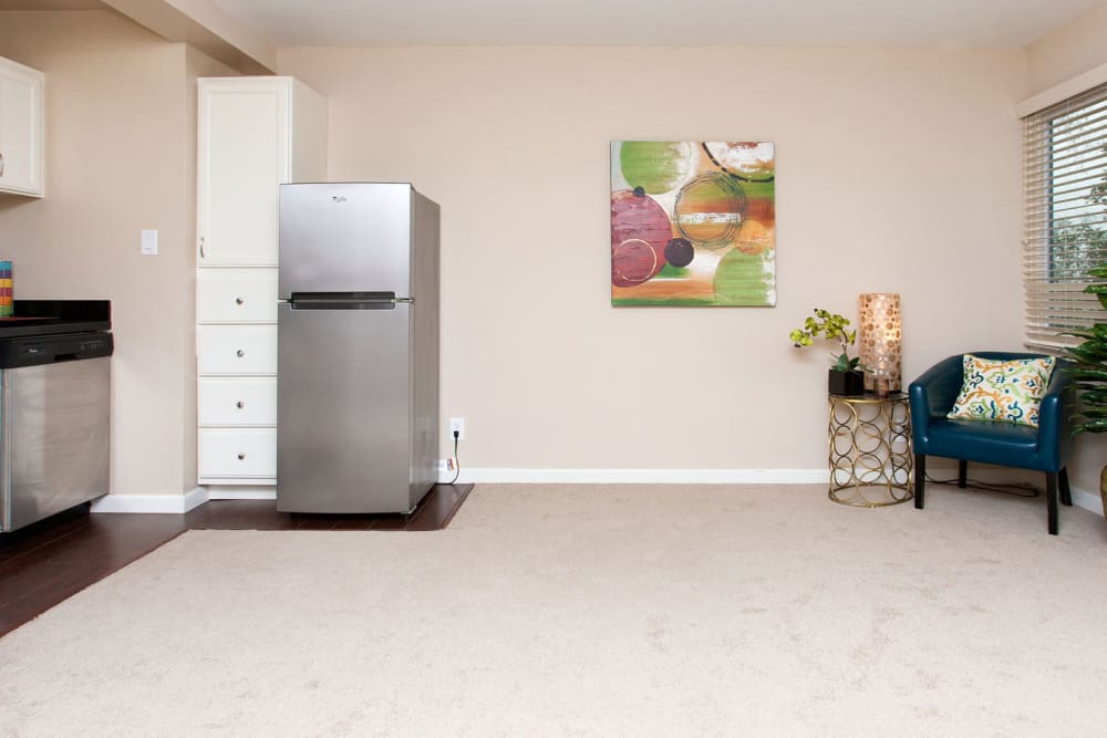 refrigerator and dining space at Alta off the Avenue in Burlingame, California