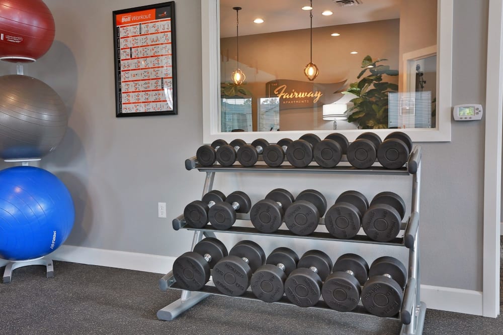 weights in the fitness center at The Fairway Apartments in Salem, Oregon