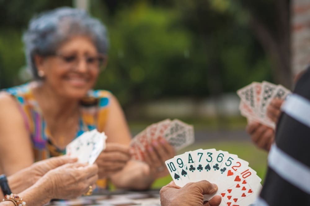 Woman playing cards at Eagleview Landing in Exton, Pennsylvania