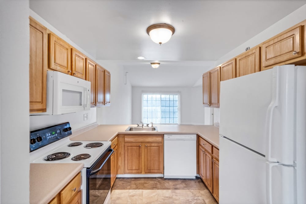 Modern kitchen in a model apartment at Eagle Rock Apartments & Townhomes at Rensselaer in Rensselaer, New York
