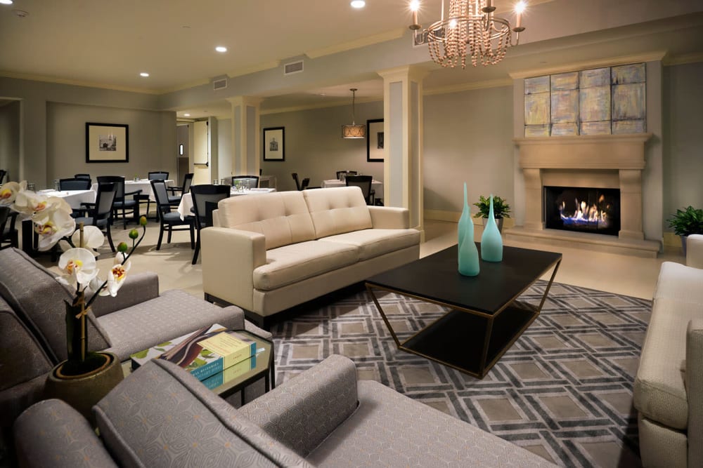 Fireplace lounge and dining area at The Blake at Charlottesville in Charlottesville, Virginia