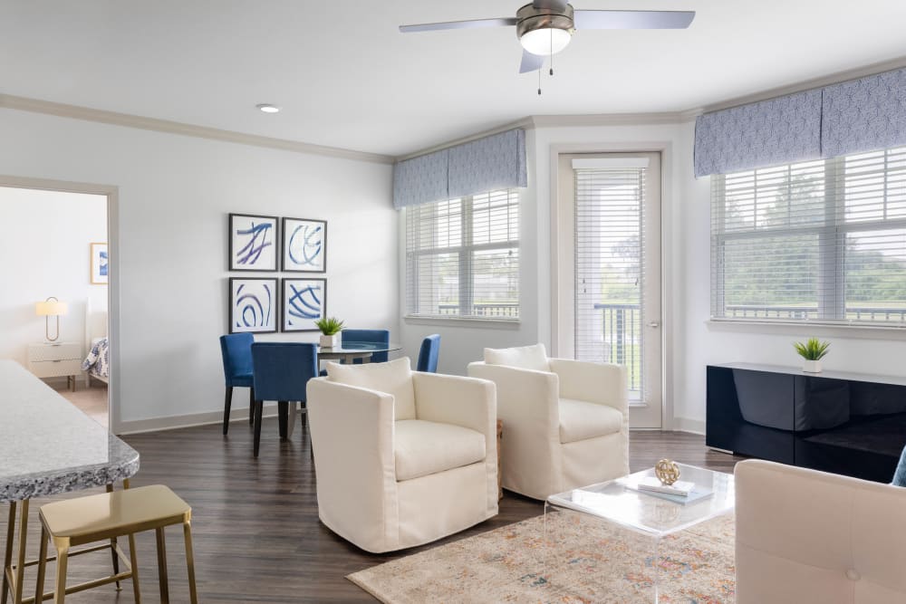 A well lit living room with seating at The Slate in Savannah, Georgia