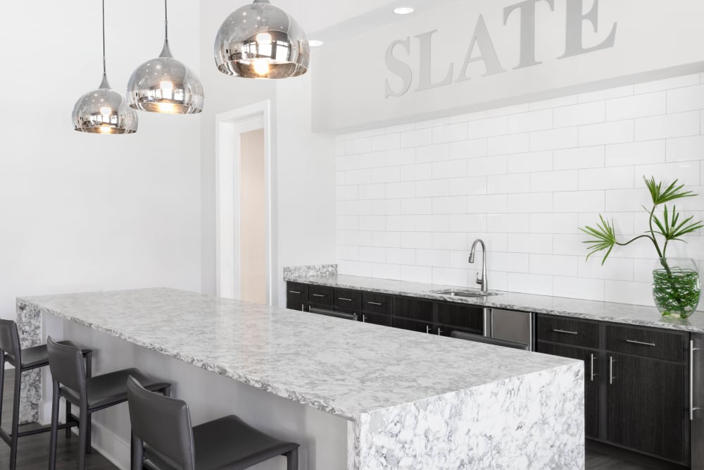 Gourmet kitchen with hardwood flooring in a model home at The Slate in Savannah, Georgia