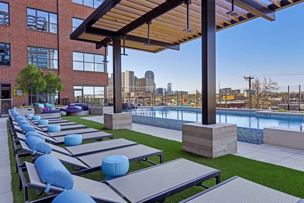 Poolside luxury lounge chairs at Indie Deep Ellum in Dallas, Texas