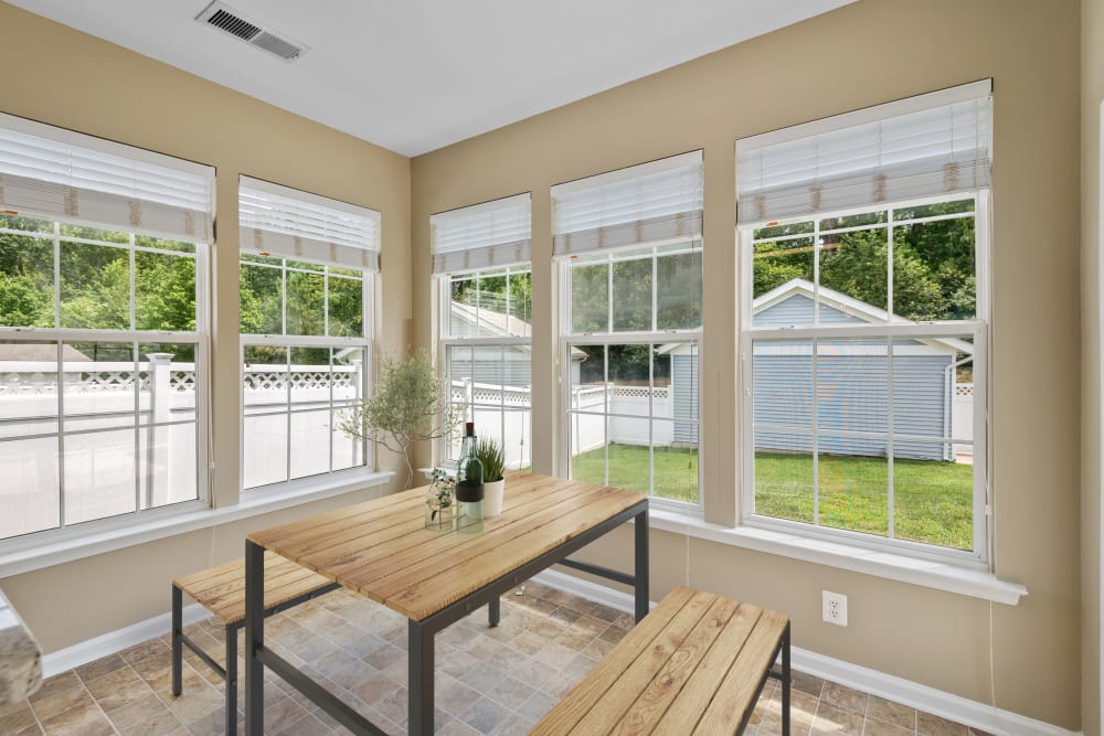 A bright dining area in a home at Challenger Estates in Patuxent River, Maryland