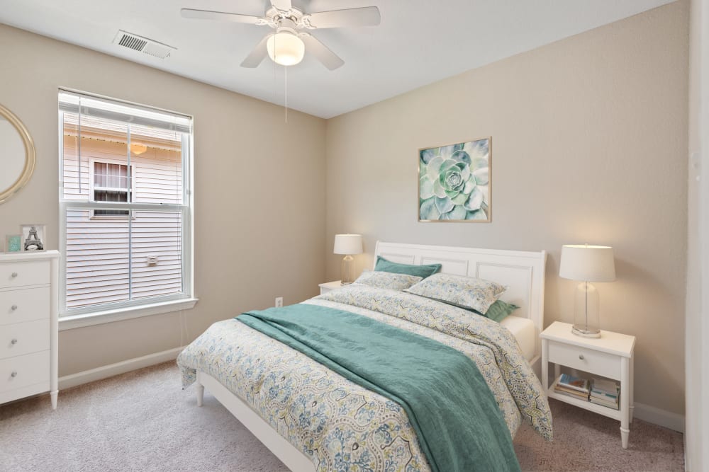 A cozy bedroom in a home at Challenger Estates in Patuxent River, Maryland