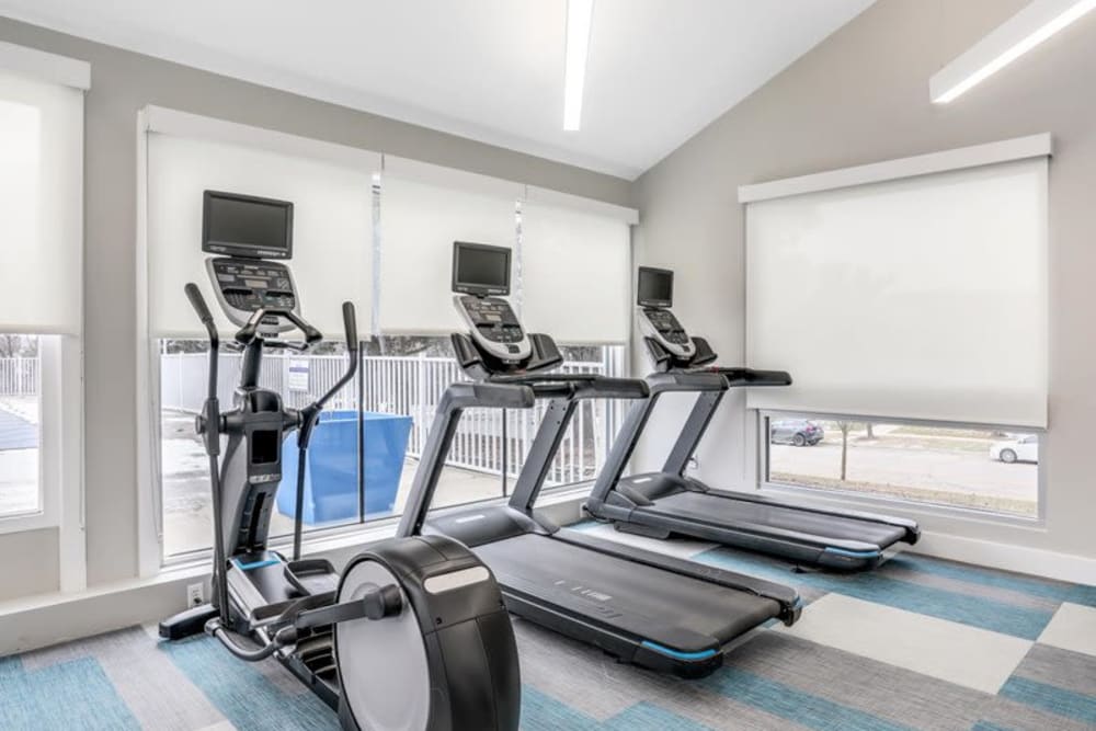 Cardio equipment in the fitness center at Briar Cove Terrace Apartments in Ann Arbor, Michigan