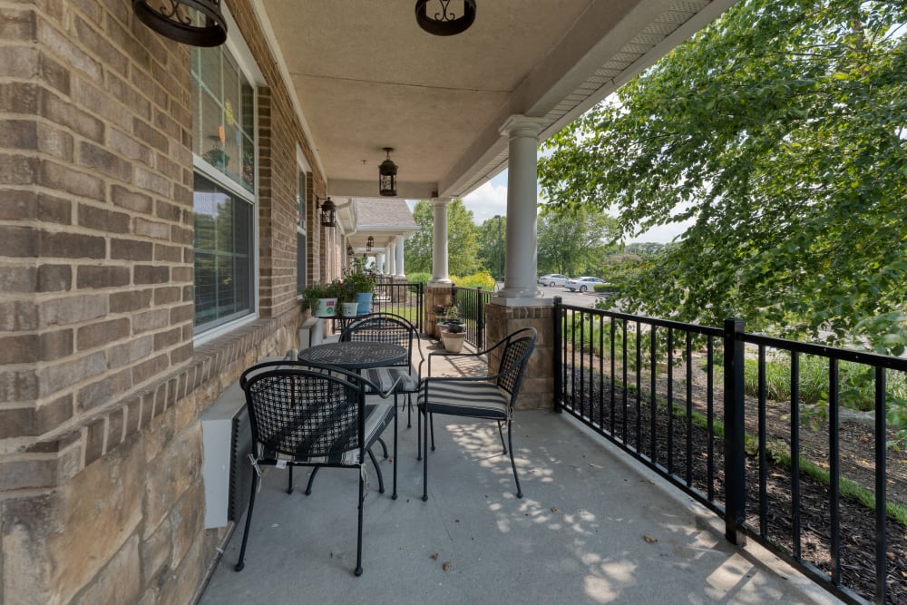 Covered deck seating at Addington Place of Shoal Creek in Kansas City, Missouri