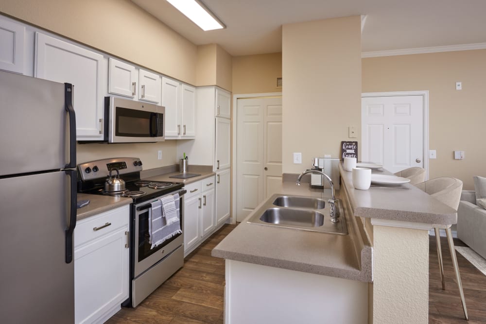 Kitchen with ample counter space at Skyecrest Apartments in Lakewood, Colorado