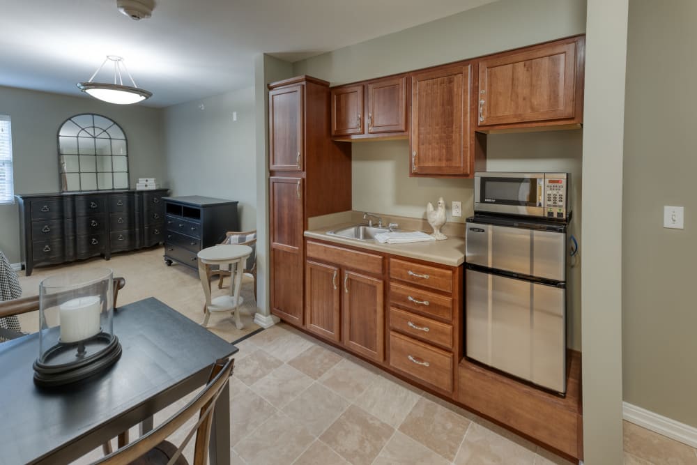 Senior apartment kitchen at Addington Place of Shiloh in Shiloh, Illinois