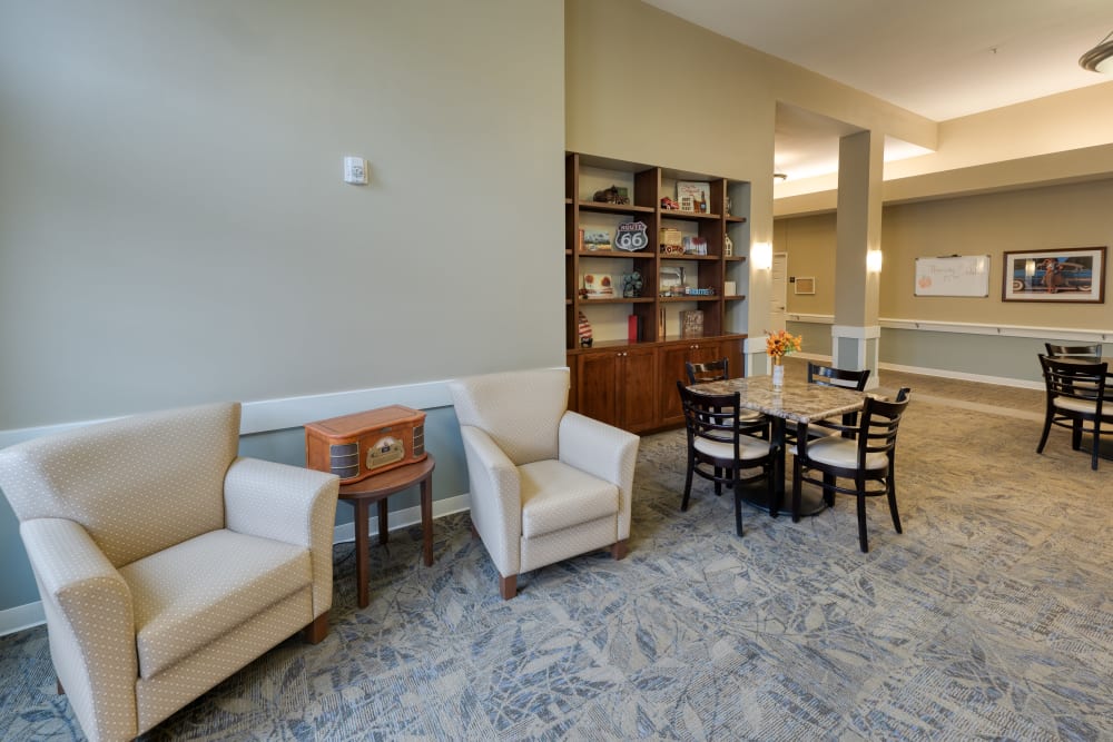 Two white chairs in a lounge at Addington Place of Edwardsville in Edwardsville, Illinois 