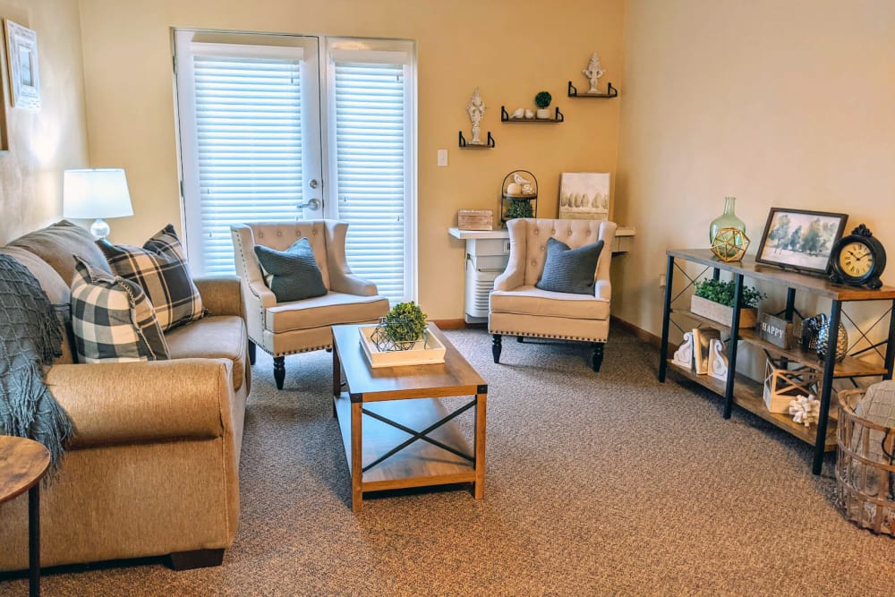 A lovely living room at Garden Place Waterloo in Waterloo, Illinois. 