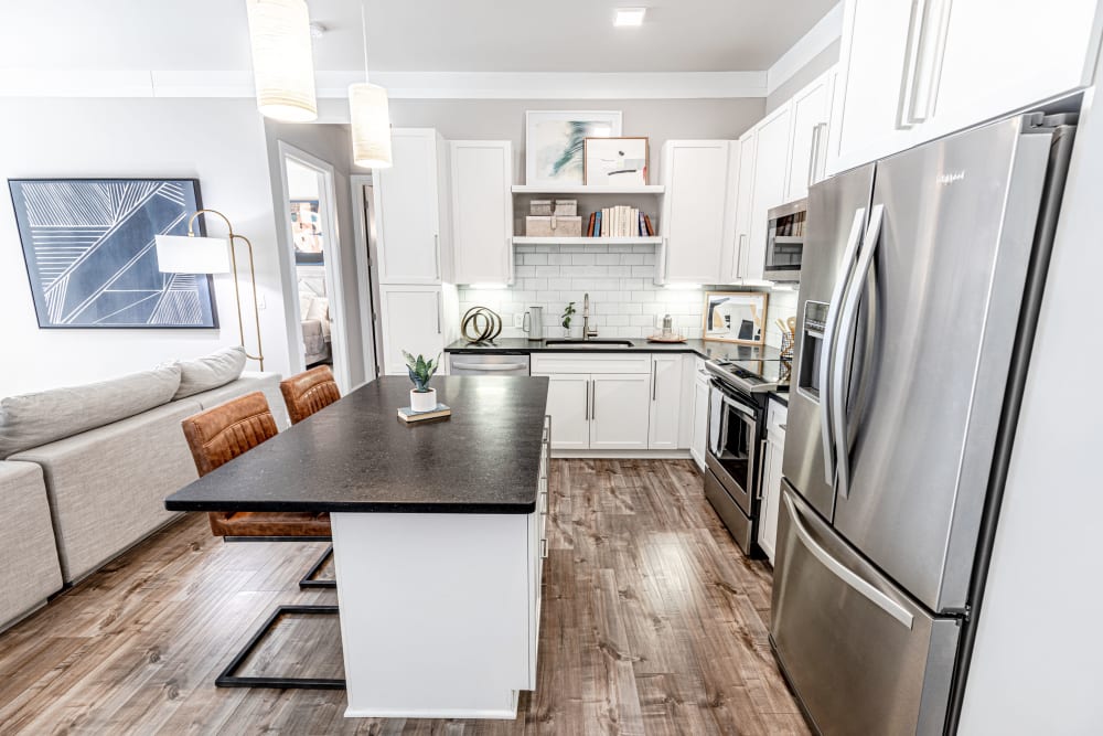 Upscale kitchen with modern amenities at The Barton | Apartments in Clayton, Missouri