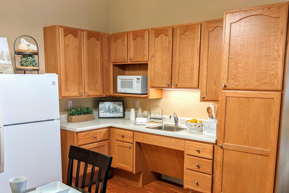 A modern kitchen layout at Garden Place Red Bud in Red Bud, Illinois