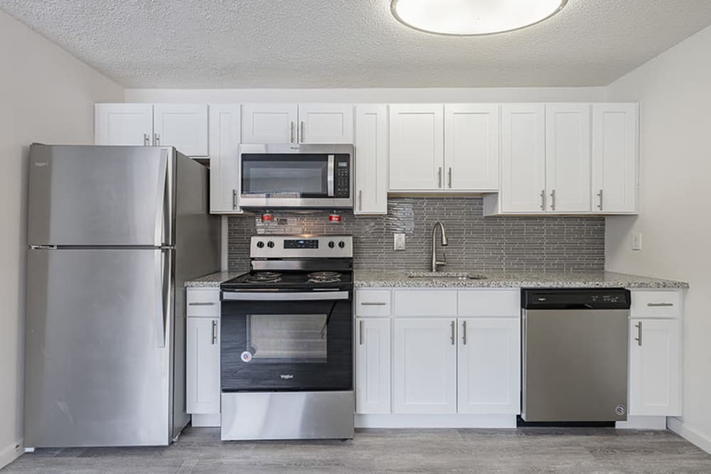 Well-equipped kitchen at Creek Hill Apartments in Webster, New York