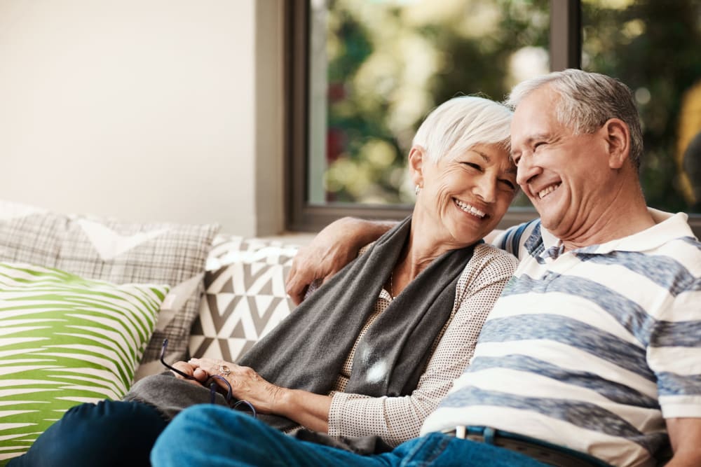 Residents sitting outside enjoying the nature at Lodi Commons Senior Living in Lodi, California