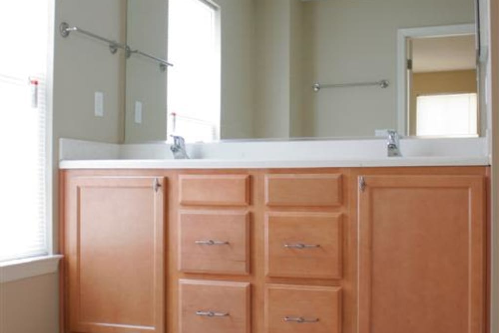 A double-vanity bathroom at The Village at New Gosport in Portsmouth, Virginia