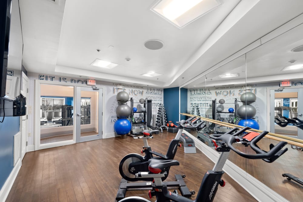 Fitness center with stationary bikes in the cardio room at Sofi Lyndhurst in Lyndhurst, New Jersey