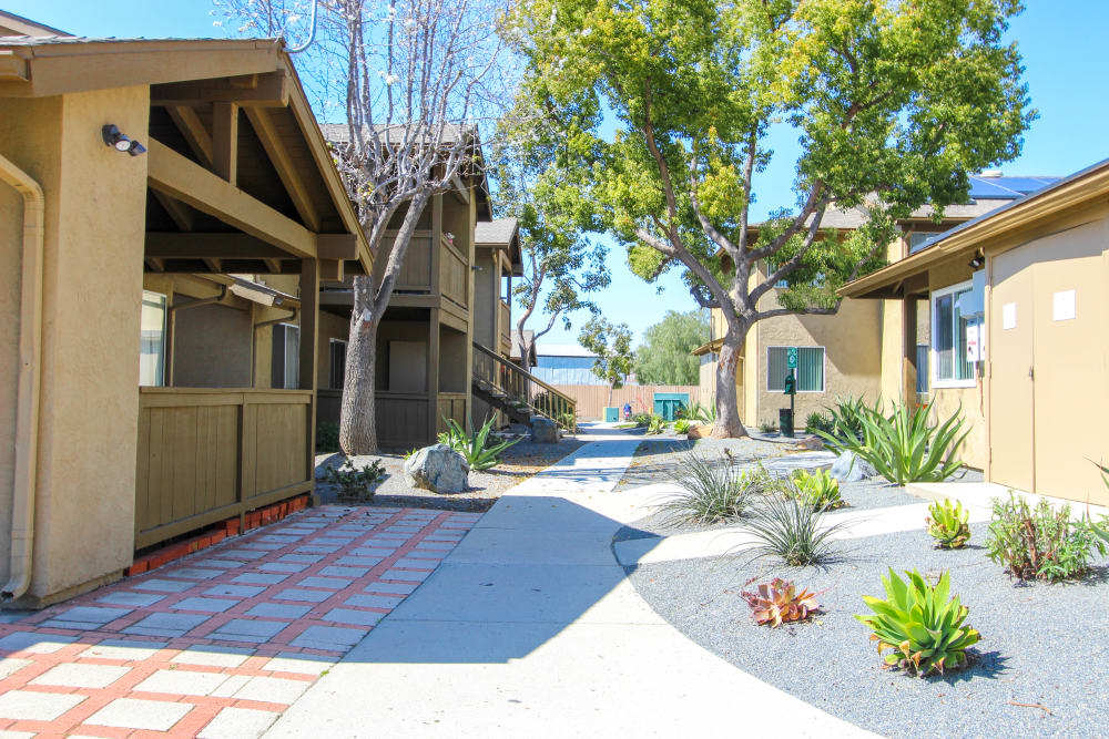 a walkway through the apartments at Ramona Vista in Ramona, California