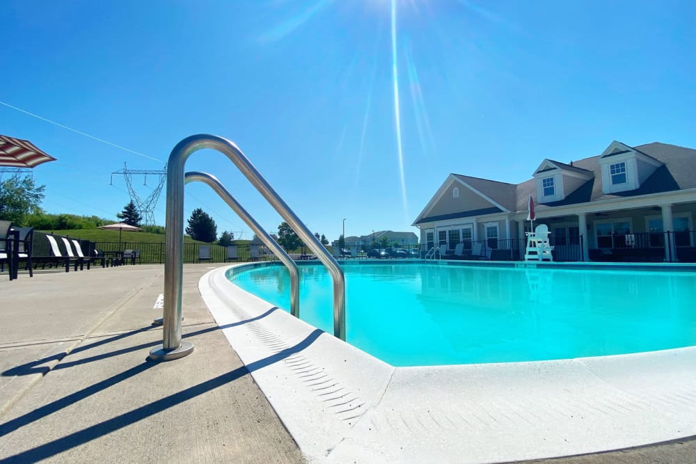 Inviting swimming pool on a beautiful day at Rivers Pointe Apartments in Liverpool, New York