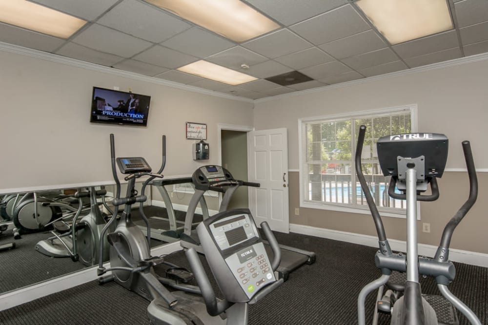 Resident fitness center at Arbor Crossing Apartments in Lithonia, Georgia
