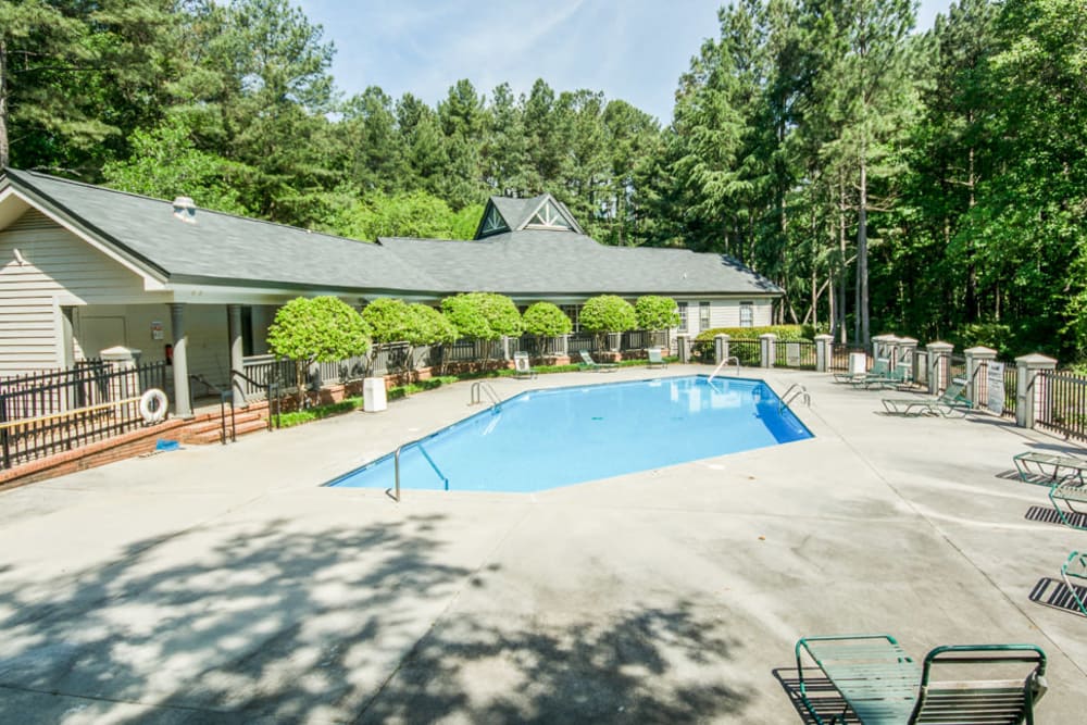 Refreshing swimming pool at Arbor Crossing Apartments in Lithonia, Georgia