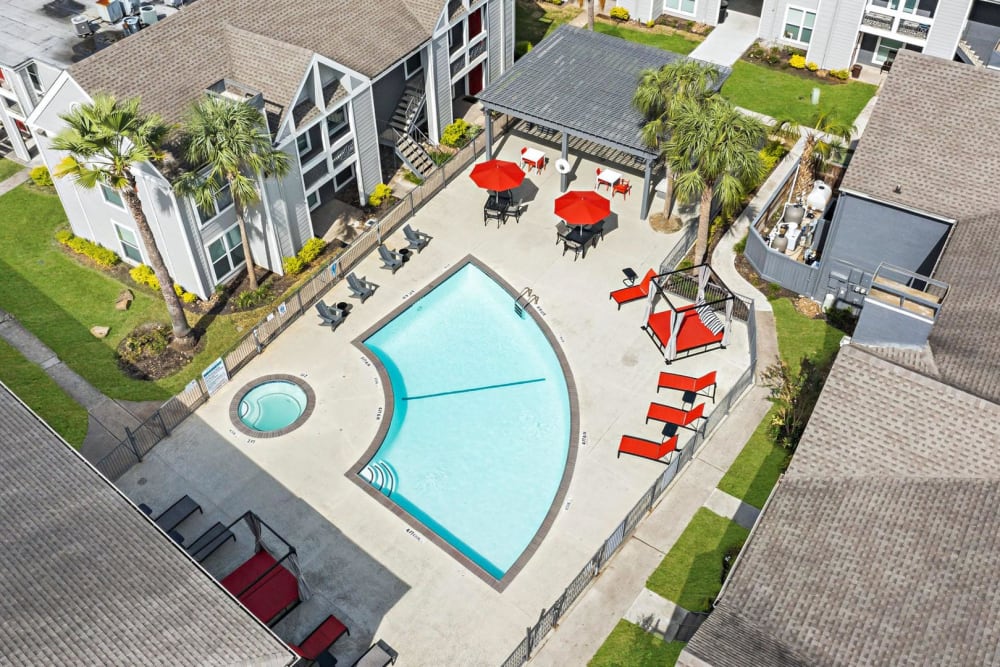 Fenced quarter-circle pool at The Estates at Avenstar in Houston, Texas