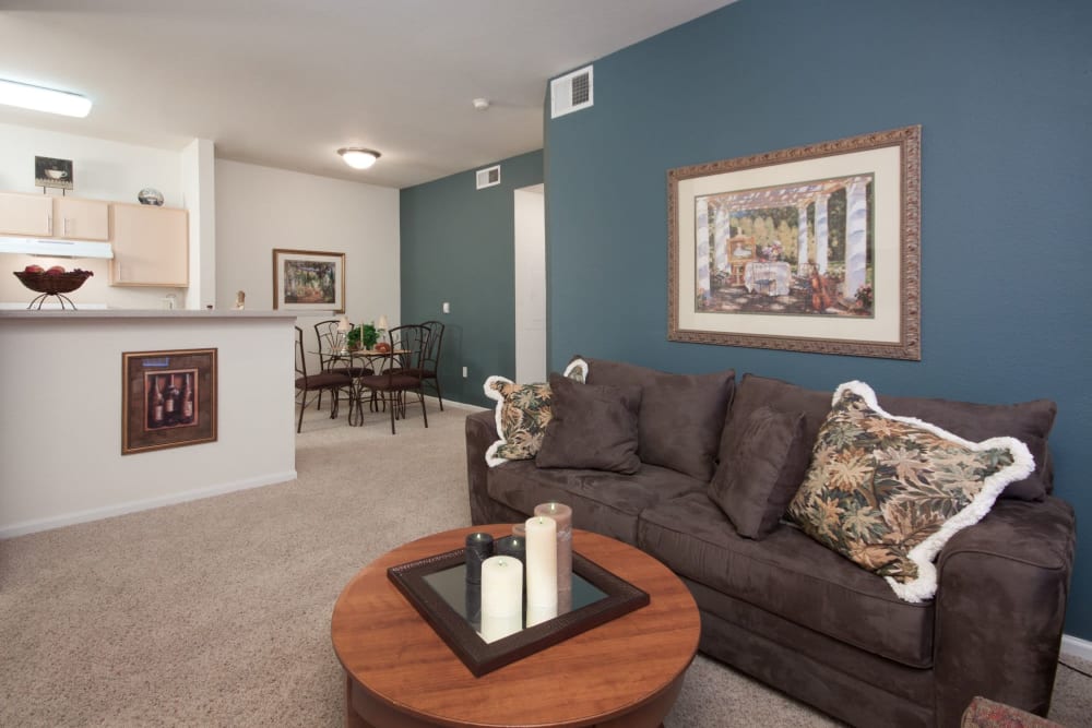 Living room in model home at Westmeadow Peaks Apartments in Colorado Springs, Colorado
