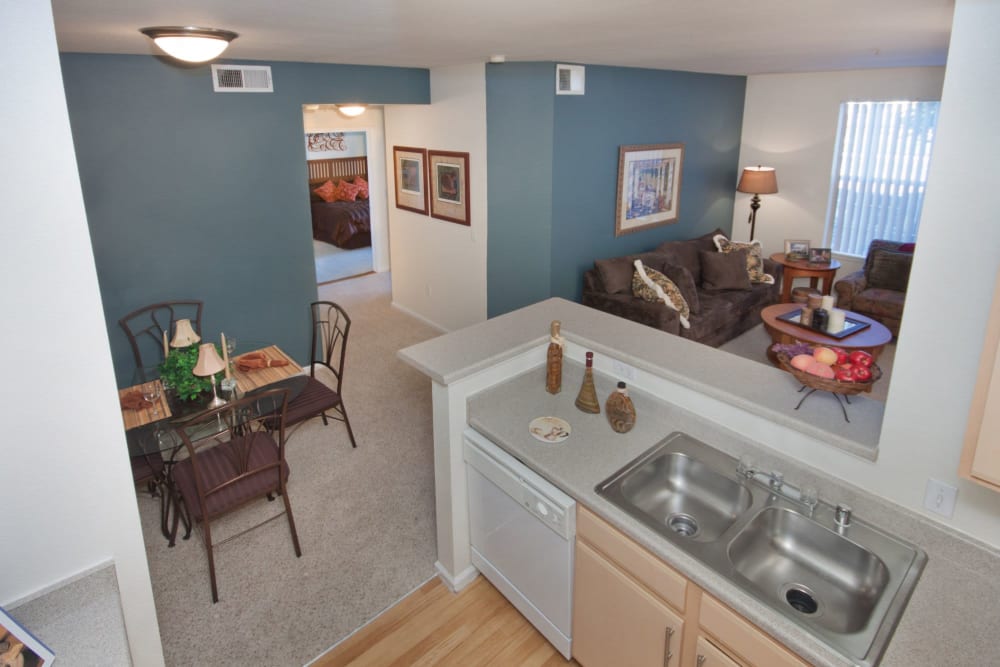 Top view of the living room and kitchen area at Westmeadow Peaks Apartments in Colorado Springs, Colorado