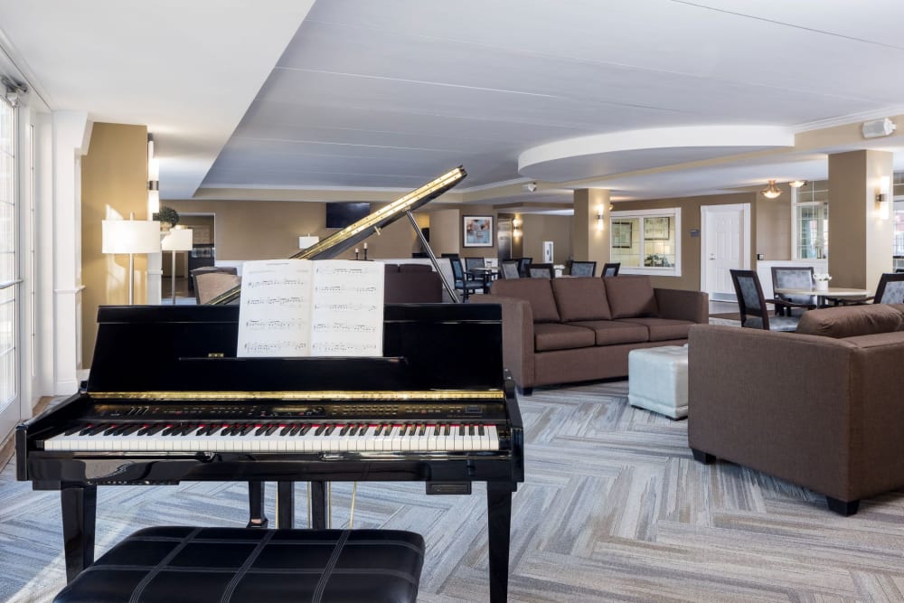 Piano in community area at Hanover Place in Tinley Park, Illinois