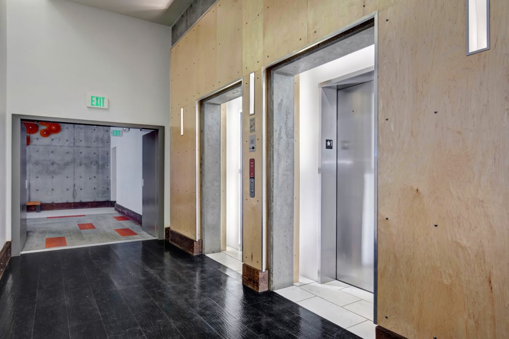 Elevators in the main lobby at Alley South Lake Union in Seattle, Washington