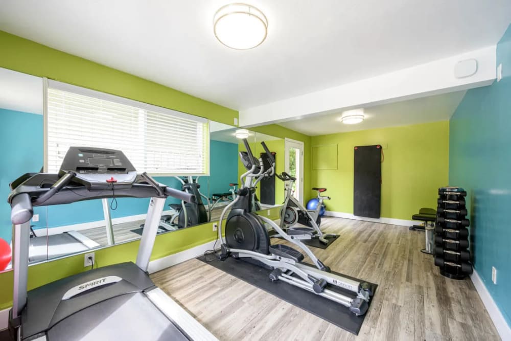 Fitness center with cardio machines for residents to use at Hillside Garden in San Mateo, California