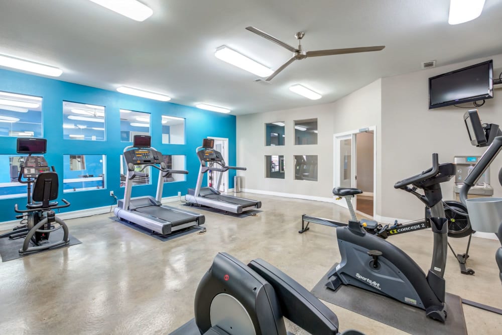 Fitness center with treadmills at Diamond at Prospect Apartments in Denver, Colorado