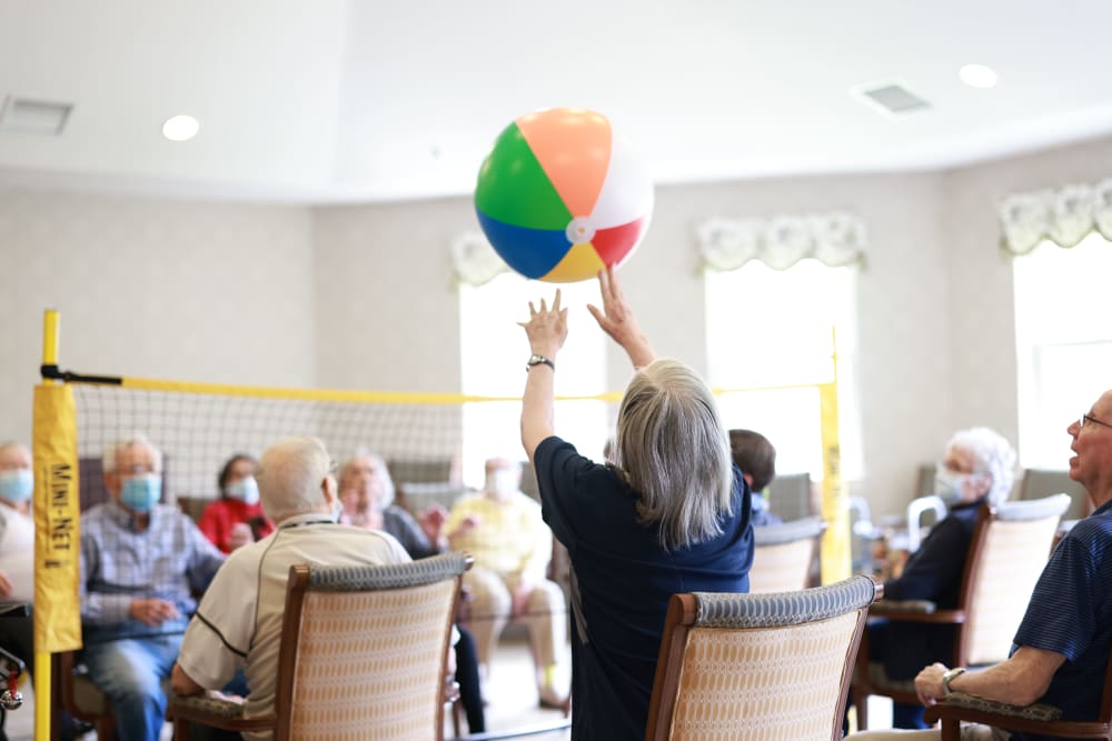 Resident playing a fun game together at The Madison Senior Living in Kansas City, Missouri