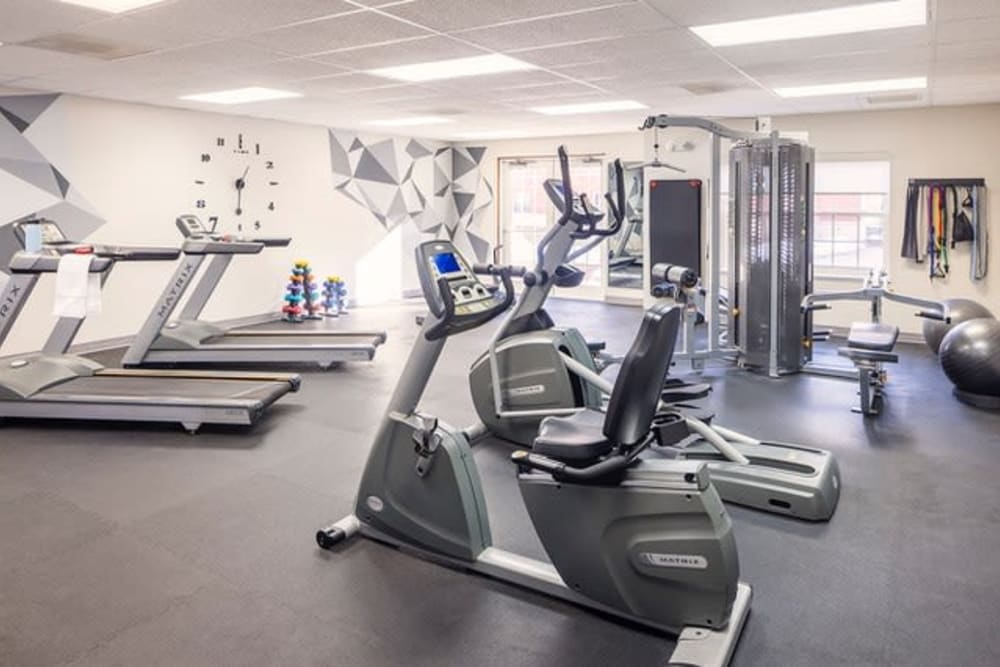 Fitness center with power equipment at Hanover Place in Tinley Park, Illinois.
