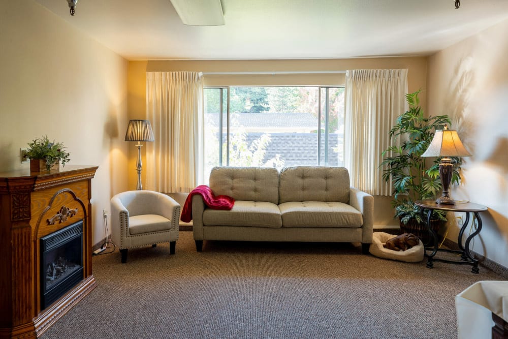 Senior apartment living room at Rosewood Villa in Bellingham, Washington