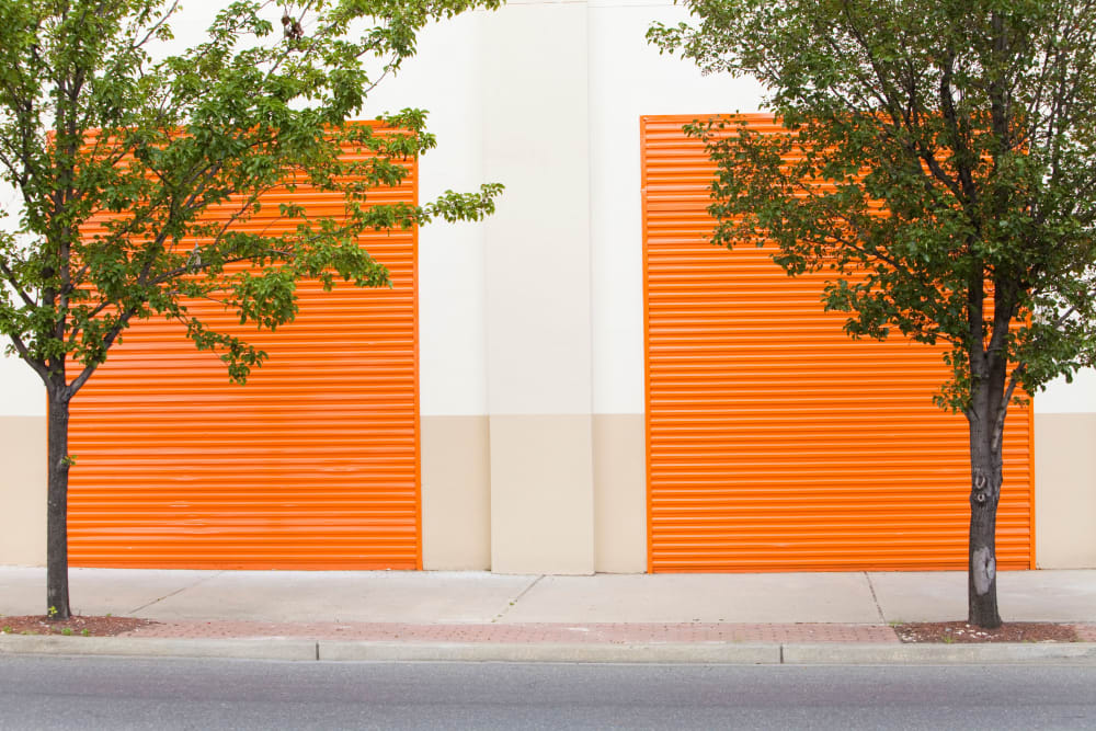 orange storage unit doors at American Self Storage – West Pittsboro in Pittsboro, North Carolina