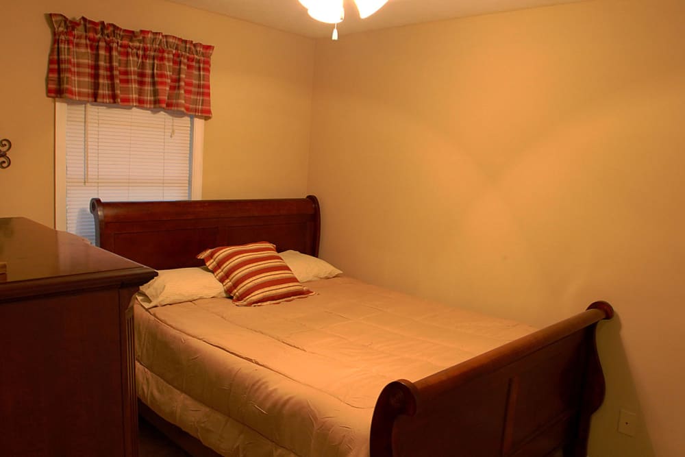 Bedroom with ceiling fan at Northcreek in Phenix City, Alabama