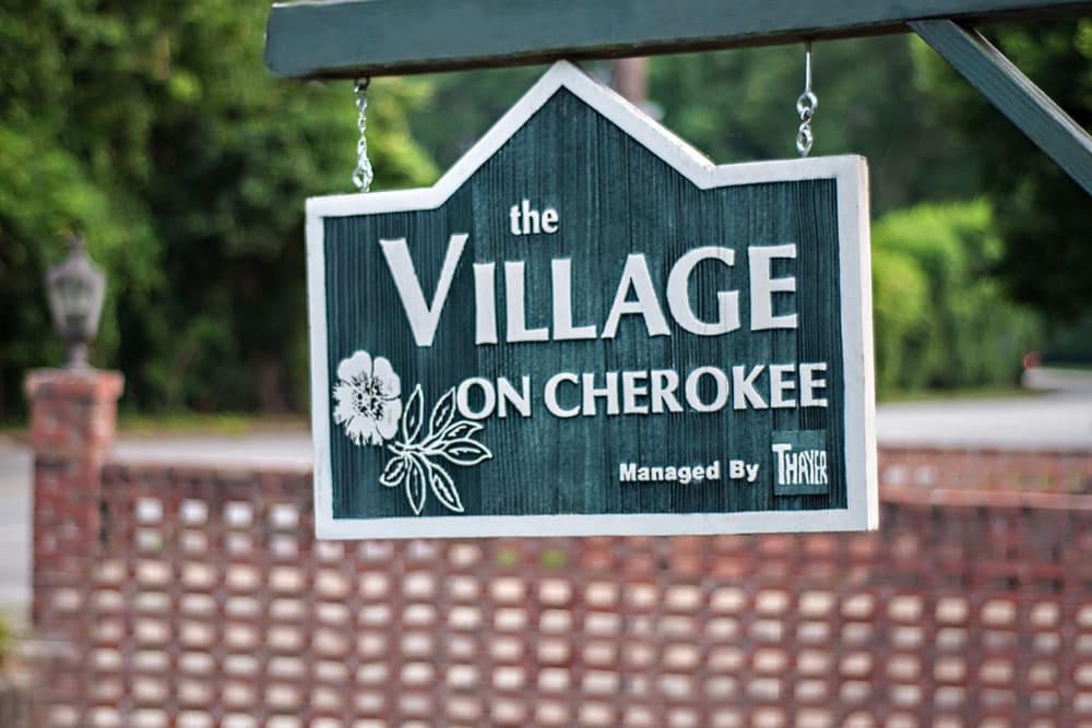 Hanging sign at The Village on Cherokee in Columbus, Georgia