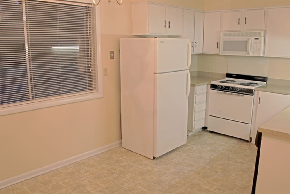 White kitchen at Gardenbrook Apartments in Columbus, Georgia