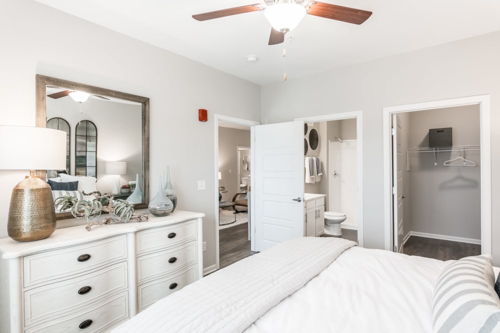 Bright bedroom with a nice ceiling fan to stay cool at Kirkwood Place in Clarksville, Tennessee