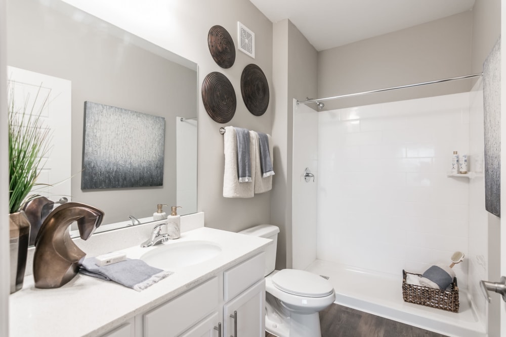 Very clean bathroom in a nicely decorated model home at Kirkwood Place in Clarksville, Tennessee