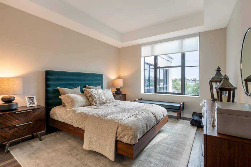 Cozy and spacious bedroom with a large window and nice view at Motif in Fort Lauderdale, Florida